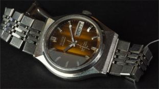 VINTAGE SEIKO LM SPECIAL, circular tigers eye dial, baton hour markers, day/ date aperture, screw