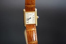 LADIES' GOLD PLATED CARTIER TANK QUARTZ WRISTWATCH, REF 140191, rectangular off white dial, 21mm