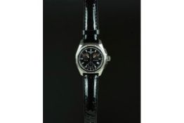 LADIES' TISSOT PRC100 CHRONOGRAPH WRISTWATCH, circular black triple register dial with silver hour