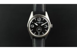 GENTLEMEN'S BELL & ROSS WRISTWATCH, a circular black dial with white Arabic and baton hour markers