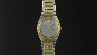 LADIES' OMEGA SEAMASTER WRISTWATCH, circular blue dial with gold hour markers and a date aperture,