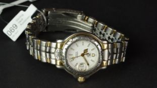 LADIES' BICOLOUR TAG HEUER PROFESSIONAL QUARTZ DATE WIRSTWATCH, ref WH1351, circular 28mm