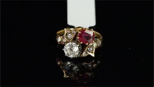 Ruby and diamond crossover ring, old cut diamond weighing an estimated 0.95ct, and a cushion cut