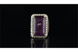 Large amethyst and diamond ring, emerald cut amethyst measuring approximately 22.4 x 14.4mm, set