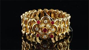 Victorian ruby and diamond expanding bracelet, central floral motif set with rubies and old cut