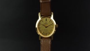 LADIES' OMEGA GENEVE WRISTWATCH, oval gold dial with hour markers and black hands, 20mm gold