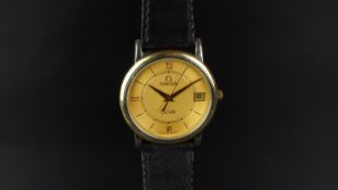 MID SIZE OMEGA DE VILLE DATE WRISTWATCH, circular two tone gold dial with gold hour markers and a