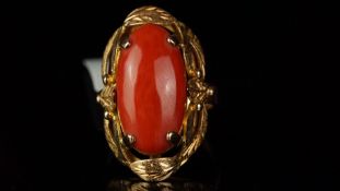 Coral ring, oval cabochon dark pink oval coral measuring approximately 19.92 x 11.4 x 4.46mm,