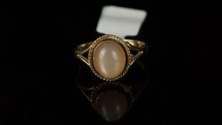 Single stone cabochon quartz ring, mounted in hallmarked 9ct yellow gold, finger size N 1/4, gross