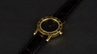 LADIES' BVLGARI 18ct GOLD WRISTWATCH, circular black dial with gold hour markers and hands,