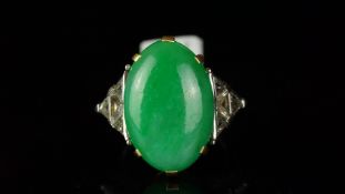 Natural jade and diamond ring, mounted in yellow metal stamped with the French eagle's head for