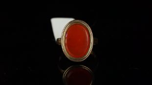 Carnelian oval shaped ring, mounted in hallmarked 15ct yellow gold, dated Birmingham 1869, finger