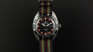 VINTAGE RODANIA AUTOMATIC DIVE WATCH, circular black dial with red and lime hour markers, day and