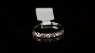 Seven stone pink sapphire and diamond half eternity ring, mounted in hallmarked 18ct white gold,