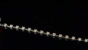 Diamond bracelet, round brilliant cut diamonds, with bar links between, estimated total diamond