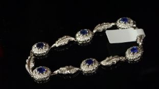 Sapphire and diamond cluster bracelet, alternating links of sapphire and diamond clusters and