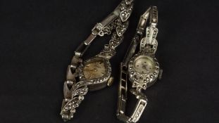 TWO LADIES' SILVER MARCASITE SET MANUAL WIND COCKTAIL WRISTWATCHES, one Everite currently running