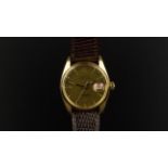 GENTLEMEN'S ROLEX OYSTER PERPETUAL DATE WRISTWATCH REF. 6534, circular dark gold dial with gold cone