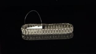 Diamond bracelet, articulated geometric design set with brilliant cut diamonds, mounted in 18ct