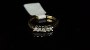 Five stone diamond ring, mounted in hallmarked 9ct yellow gold, five brilliant cut diamonds, claw