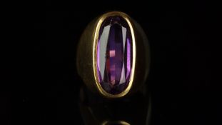 Single stone oval amethyst ring, with two inscriptions inside the shank reading 'David 4.9.57'