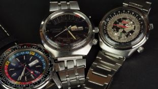 THREE GENTLEMEN'S WRISTWATCHES - RICOH AUTOMATIC DAY/DATE WORLD TIME, ref 061215, 42mm stainless