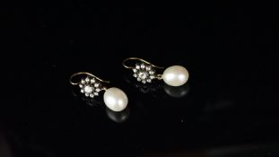 Pearl and diamond drop earrings, rose cut diamond clusters, suspending a 10.5 x 8.8mm cultured