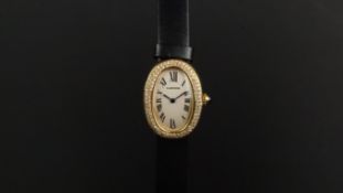 LADIES' CARTIER BAIGNOIRE 18ct GOLD DIAMOND SET WRISTWATCH REF. 1954, oval off white dial with Roman