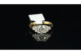Art Deco diamond ring, central old cut diamond weighing an estimated 1.10ct, with three old cut