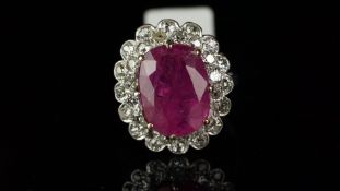 Burma ruby and diamond oval cluster ring, mounted in unmarked white metal, central cushion shaped