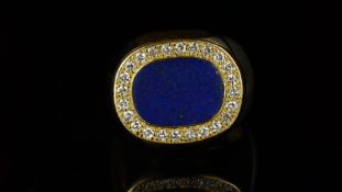 Lapis lazuli and diamond signet ring, central oval panel of lapis lazuli, surrounded by round