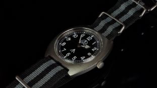 MILITARY OLLECH & WAJS WRIST WATCH, circular black dial with Arabic numerals, outer minuet track,
