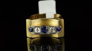Sapphire and diamond cocktail ring, heavy scroll style setting, with two old cut diamonds and