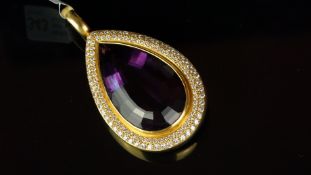 Amethyst and diamond pendant, pear shaped amethyst measuring approximately 34 x 19mm, with a two row