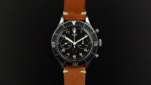 GENTLEMEN'S HEUER 'BUND' MILITARY FLYBACK CHRONOGRAPH WRISTWATCH REF. 1550 89, circular black twin