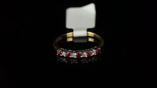 Nine stone ruby and diamond half eternity ring, mounted in hallmarked 9ct yellow gold, five round