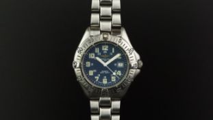 MID SIZE BREITLING QUARTZ WRISTWATCH REF. A57035, circular blue dial with luminous Arabic numerals