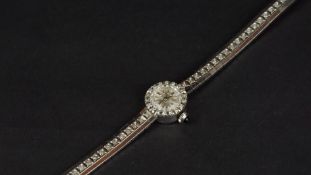 LADIES' 18ct WHITE GOLD DIAMOND SET BAUME & MERCIER GENEVE QUARTZ, 15mm diamond set case with silver