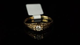 Single stone diamond ring, mounted in hallmarked 9ct yellow gold, high scroll design setting,