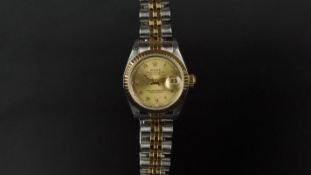 LADIES' ROLEX OYSTER PERPETUAL DATEJUST FULL SET REF 69173, circular champagne dial with gold
