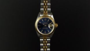 LADIES' ROLEX OYSTER PERPETUAL DATE JUST REF: 7913, circular blue dial, baton hour markers, steel