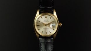 GENTLEMEN'S ROLEX OYSTER PERPETUAL DATE REF 1500, circular champagne dial with baton hour markers,