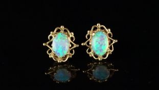 Synthetic opal stud earrings in 9ct yellow gold