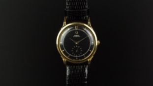 GENTLEMEN'S OMEGA AUTOMATIC 18ct GOLD BUMPER WRISTWATCH, circular black dial with inner minute track
