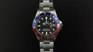 GENTLEMEN'S VINTAGE ROLEX OYSTER PERPETUAL GMT WRISTWATCH REFERENCE 1675, circular black dial,