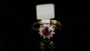 Ruby and diamond cluster ring, mounted in hallmarked 9ct yellow gold, central round ruby, surrounded