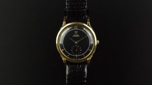 GENTLEMEN'S OMEGA AUTOMATIC 18ct GOLD BUMPER WRISTWATCH, circular black dial with inner minute track