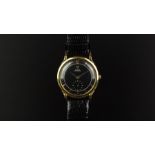 GENTLEMEN'S OMEGA AUTOMATIC 18ct GOLD BUMPER WRISTWATCH, circular black dial with inner minute track