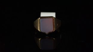 Chalcedony shield shaped signet ring, mounted in hallmarked 9ct yellow gold, dated Birmingham