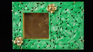Carved jade and diamond photo frame, mounted in yellow metal stamped with the French eagle's head,